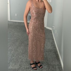 Brand new beaded cocktail dress with tags still attached size 2, color rose gold